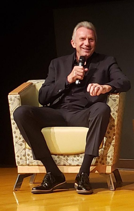 Joe Montana speaking at the Helene Glen Auditorium.