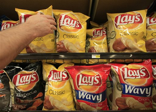 Photo courtesy of AP Photos. Bags of potato chips are displayed at a market in Glendale, Calif. 