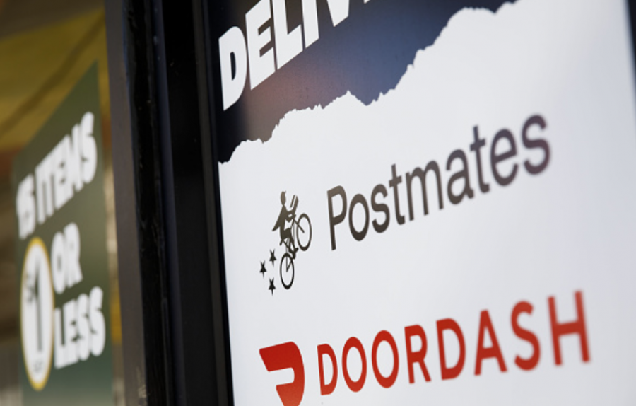 Photo courtesy of Gety Images. Postmates and Doordash provide people with food delivery options.