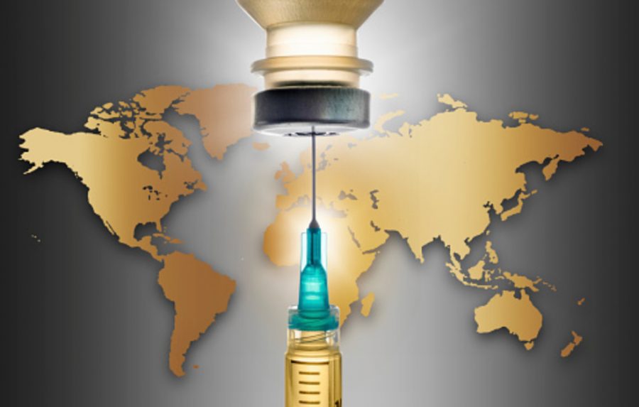 Covid-19 vaccine with world map in background. (Photo courtesy of Getty Images.)
