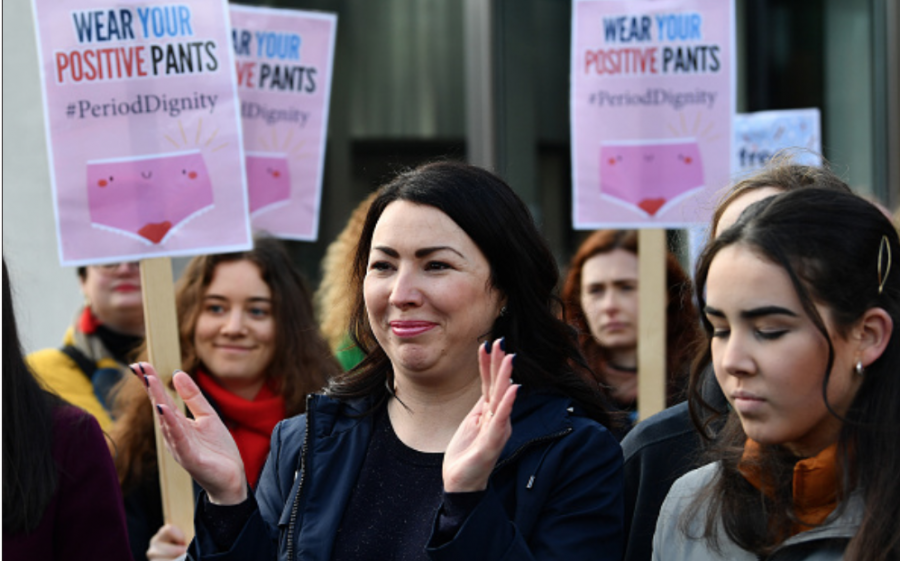 Photo courtesy of Getty Images. MSP Monica Lennon joins campaigners and activists during a rally outside the Scottish Parliament in support of the Scottish governments support for the Period Products Bill on February 25, 2020 in Edinburgh, Scotland. 
