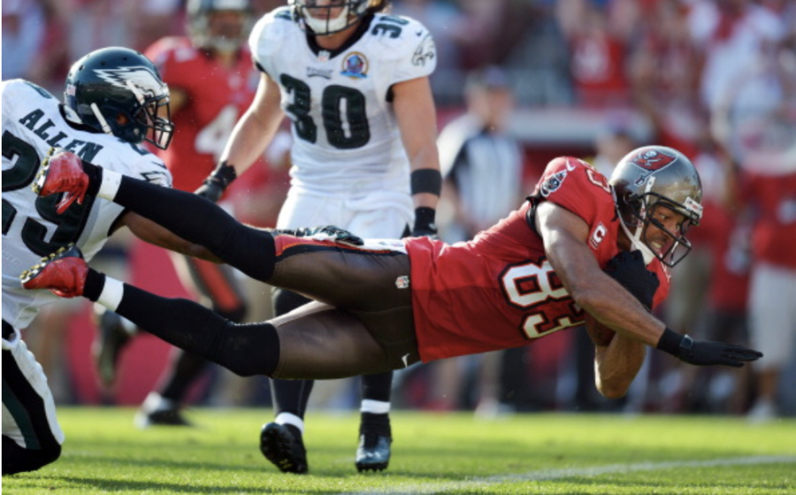 Photo courtesy of Getty Images by Drew Hallowell. Vincent Jackson #83 of the Tampa Bay Buccaneers dives into the end zone for a touchdown past Nate Allen #29 of the Philadelphia Eagles at Raymond James Stadium on Dec. 9, 2012 in Tampa, Fla. 