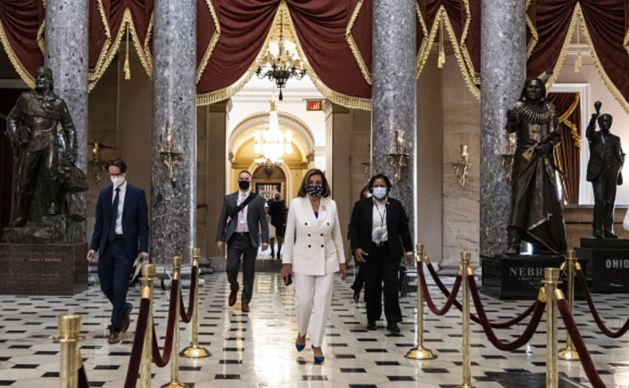 Photo courtesy of Samuel Corum/Getty Images. U.S. House Speaker Nancy Pelosi walks to her office from the House floor at the U.S. Capitol in Washington, D.C., U.S., on Wednesday, March 10, 2021. The House is poised to send the $1.9 trillion COVID-19 relief plan to President Biden for his signature.