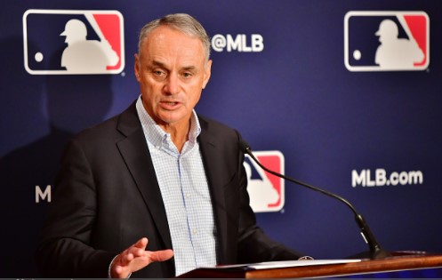 MLB Commissioner Rob Manfred answers questions during an MLB owner's meeting on February 10, 2022 in Orlando Florida (Photo by Julio Aguilar/Getty Images)