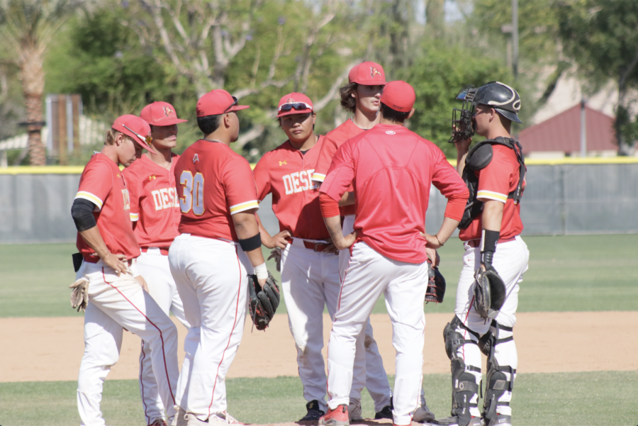 Photo courtesy of Hudson Myers, Pitching Coach Reid Santos on a mound visit with players