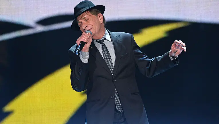 Photo courtesy of Ethan Miller/BET/Getty Images. Bobby Caldwell performing at the Soul Train Awards (2013).