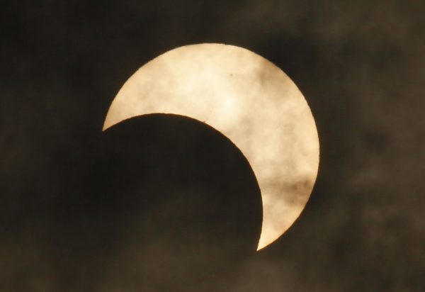 Photo courtesy of Associate Press//Kin Cheung. An annular solar eclipse is seen in on April 7, 2024. 