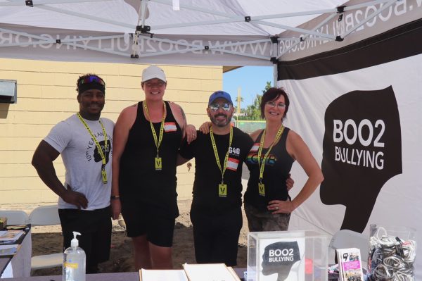  Photo courtesy of The Chaparral/Aramis Rivera. Volunteers & Boo2Bullying ambassadors helping at the entrance tent.