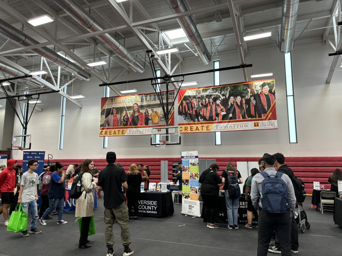 Photo courtesy of the Chaparral/Layla Freiberg. Students gather around booths for internship opportunities at the Career and Internship Fair. 