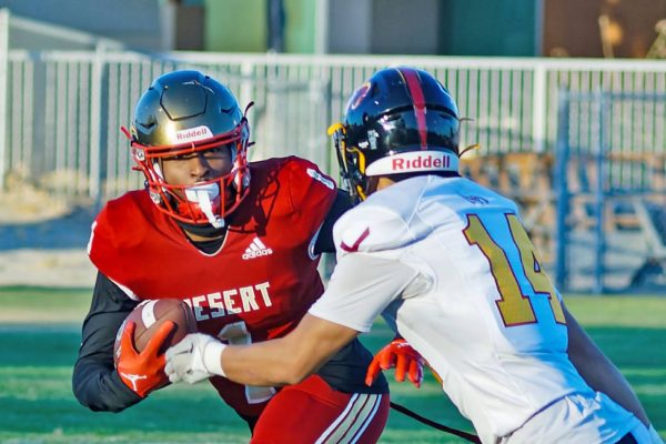 Photo courtesy of Dale Beck.  Victor Valley is attempting to steal the ball from COD player, Michael Jenkins, Jr.