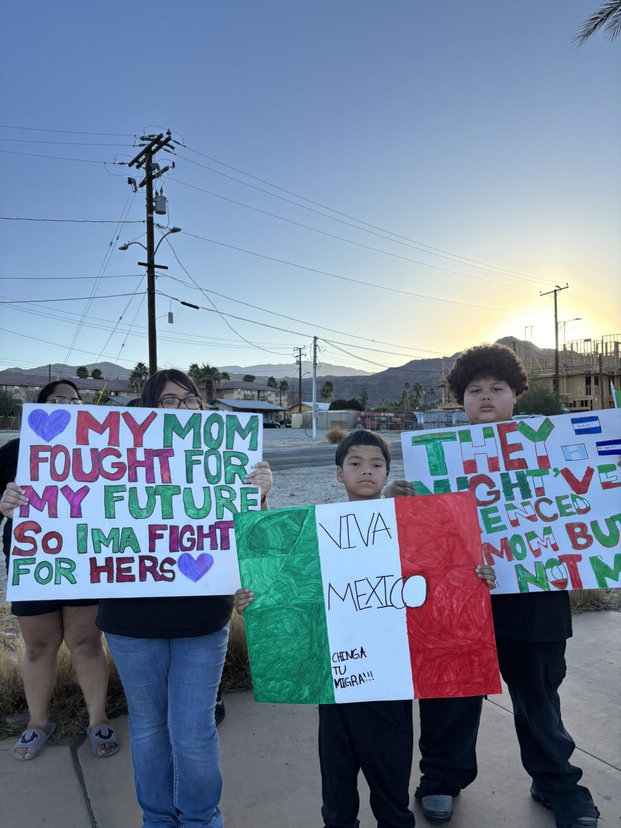 Photo courtesy of The Chaparral/Layla Freiberg. Young protestors in Cathedral City hold up their signs. 