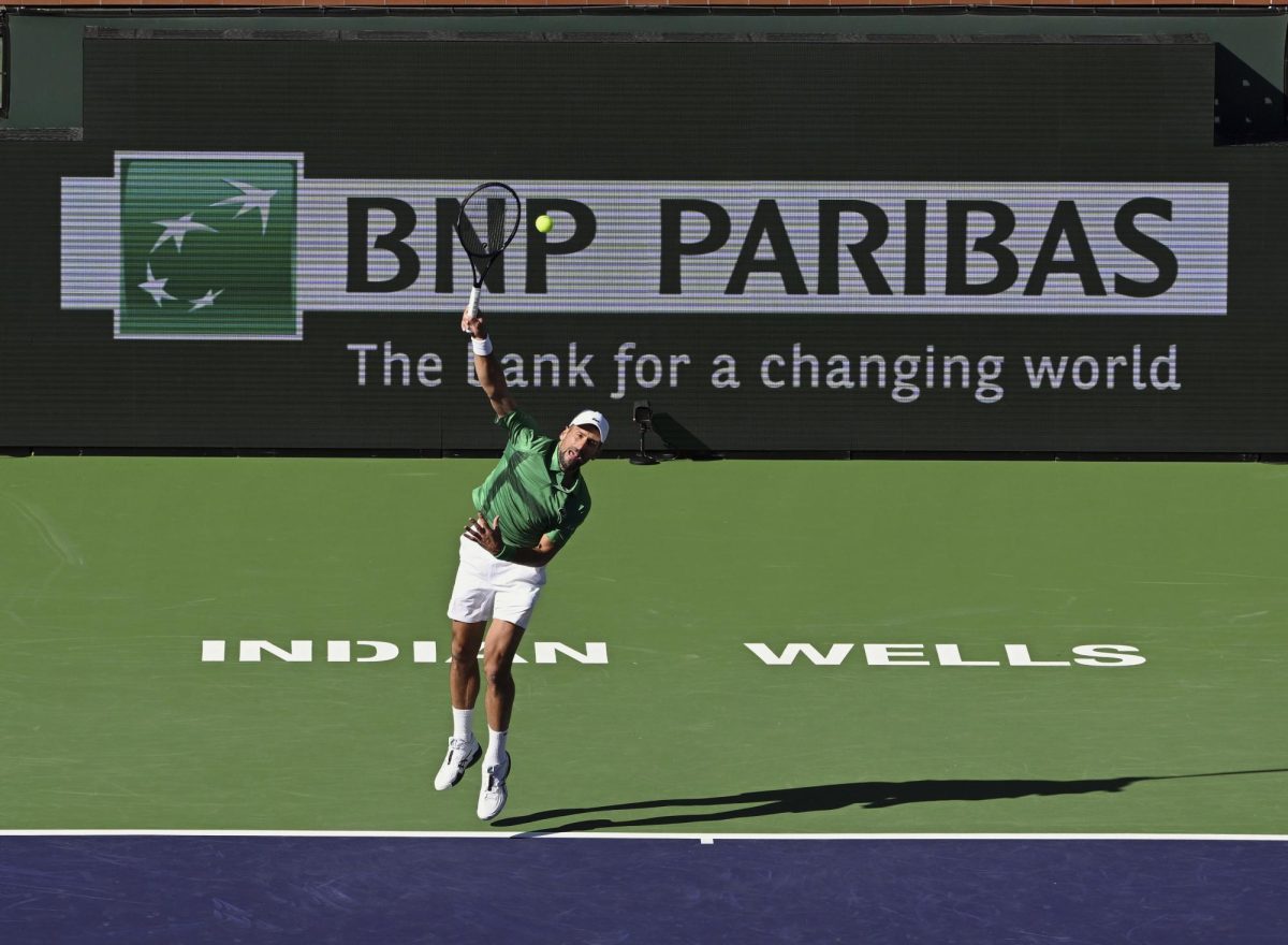 Photo courtesy of Icon Sportswire via AP Images/John Cordes. Novak Djokovic (SRB) serving during an ATP tennis match played on March 8, 2025 at the BNP Paribas Open played at the Indian Wells Tennis Garden in Indian Wells, CA.
