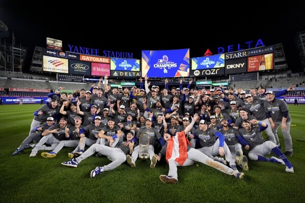 Photo courtesy of AP/Brynn Anderson. Los Angeles Dodgers pose after their win against the Toronto Blue Jays in Game 7 of baseball’s World Series, Sunday, Nov. 2, 2025, in Toronto. 