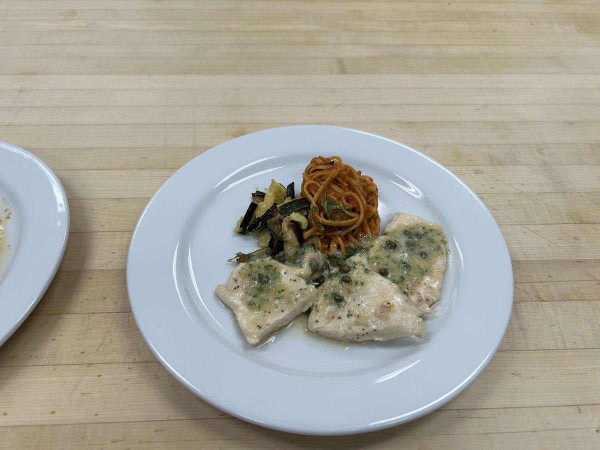 Photo courtesy of The Chaparral/Piper Gregory. Chicken piccata with pasta and salad.