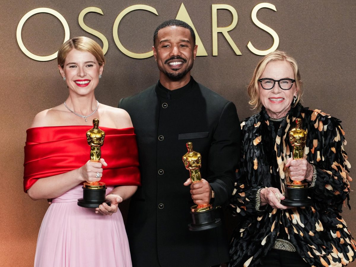  Photo courtesy of Sthanlee B. Mirador. Jessie Buckley, winner for Best Actress in a Leading Role for Hamnet, Michael B. Jordan, winner for Best Actor in a Leading Role for Sinners, and Amy Madigan, Best Supporting Actress for her role as the villainous Aunt Gladys in the horror film Weapons, posing in the press room at the The 98th Academy Awards at The Dolby Theatre on March 15, 2026.