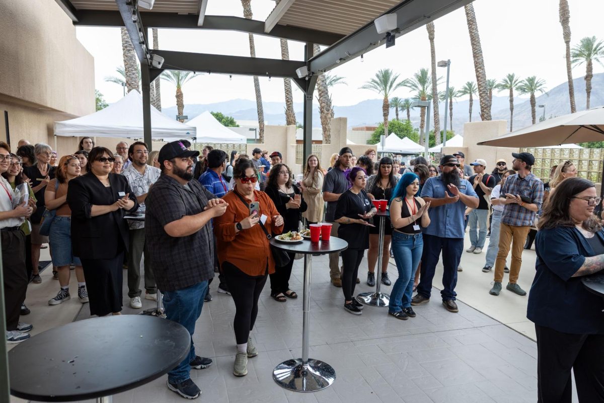 Photo courtesy of the Walter N. Marks Center for the Arts. Participants gather to witness the award ceremony.